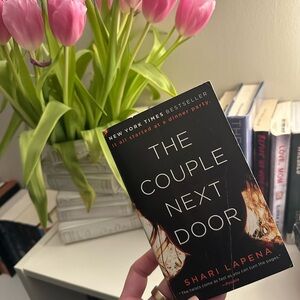 The Couple Next Door by - Black Cover